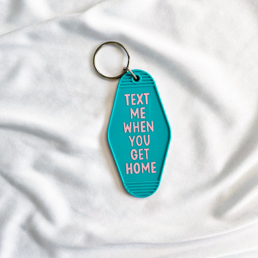 text me when you get home motel keychain